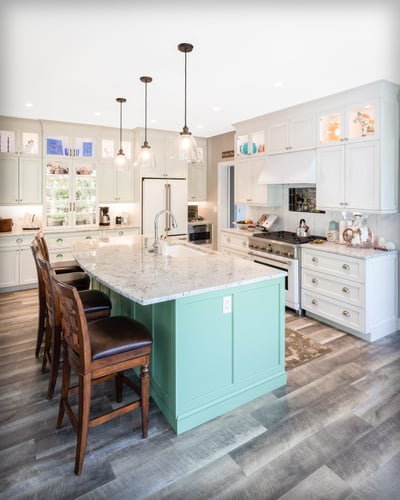 Full View of Remodeled kitchen with Large Island and White Kitchen Cabinetry  | Sunwood Home Builders & Remodelers